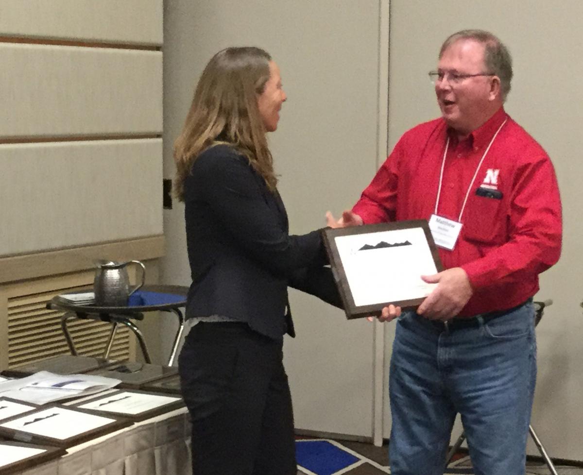 Extension Specialist Matt Stockton receives the Outstanding Extension Program Award from the Western Agricultural Eocnomics Association.
