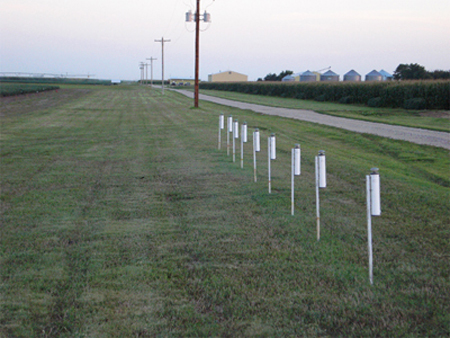 Typical installation of the ETgages by the service road about 50-69 ft from the crop field in an open area
