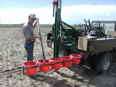 Rex Nielsen, agronomy technician at UNL's Panhandle Research and Extension Center, samples soild to determine nutrient content.