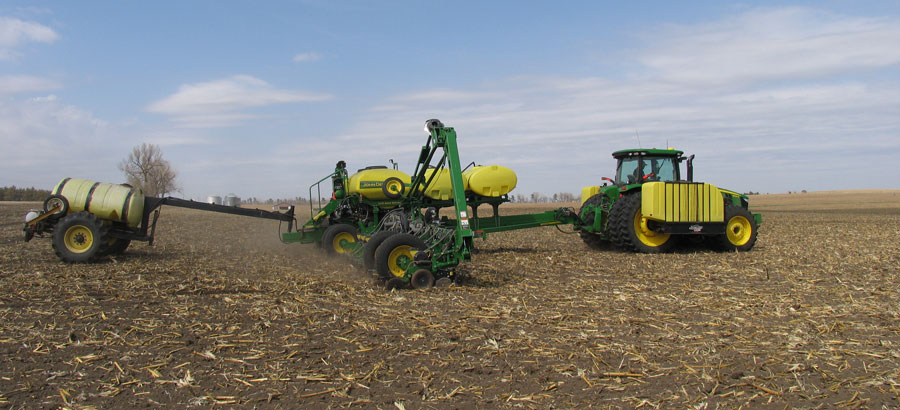 Combine corn planting in Antelope County