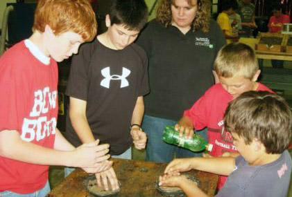 boys at youth program on crop science
