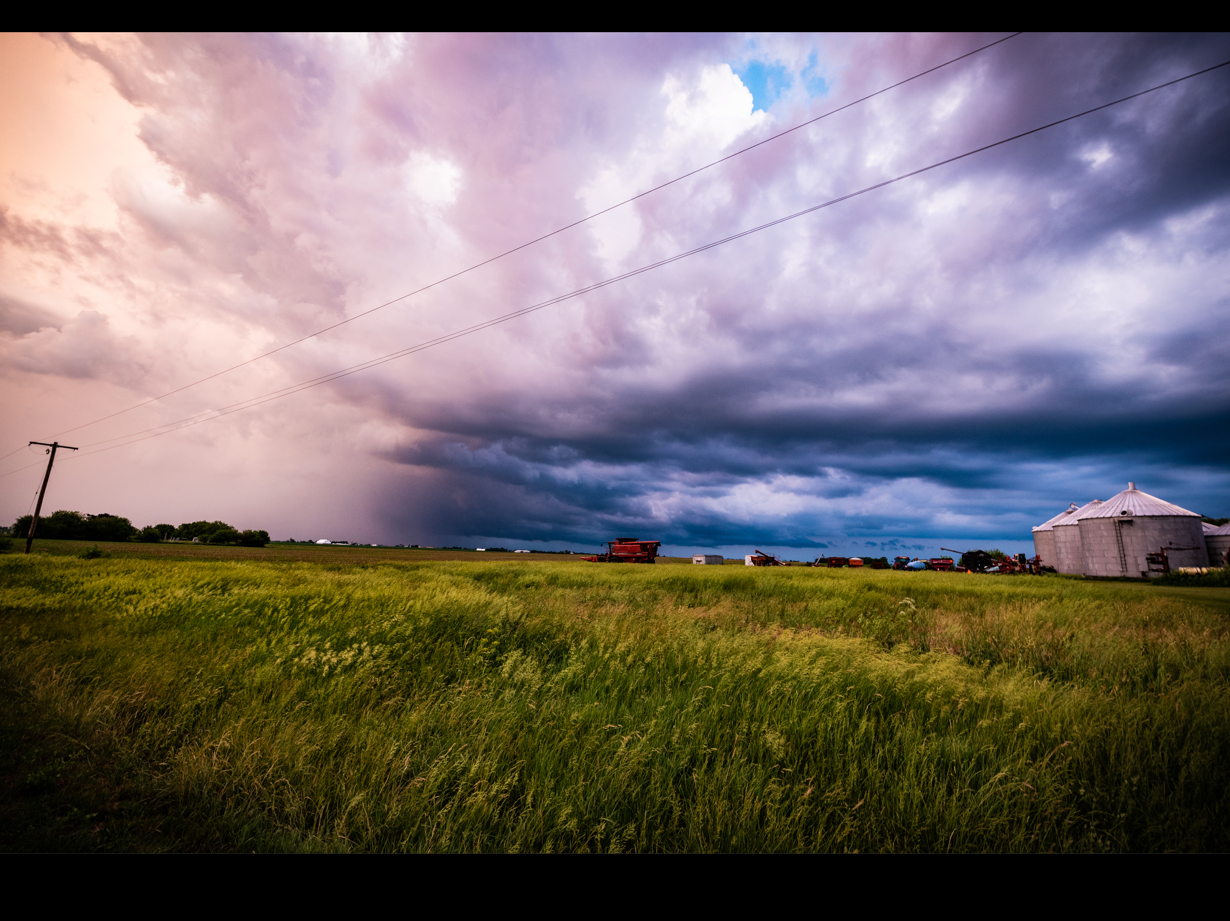 rainstorm over farm