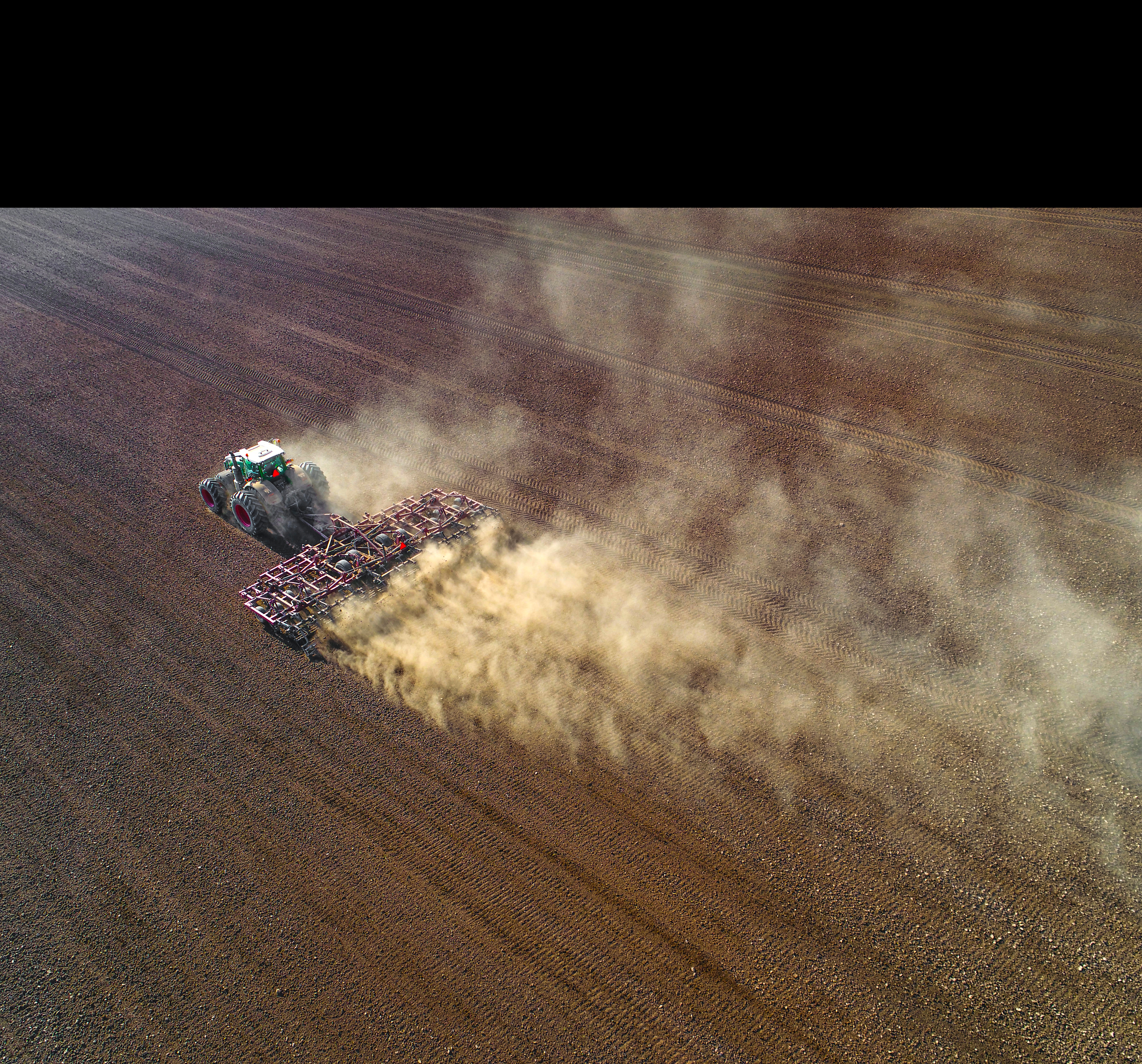 tractor tilling field