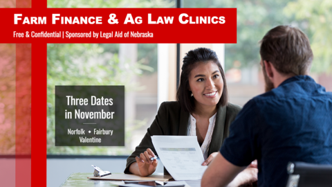 A woman smiles while talking with a man across a table covered in papers. Text overlay reads: “Farm Finance & Ag Law Clinics — Free & Confidential | Sponsored by Legal Aid of Nebraska. Three Dates in November: Norfolk, Fairbury, Valentine.
