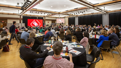More than 260 faculty, university and community leaders work together at tables in the Nebraska Union during the Research and Innovation Convening on May 7. The strategic planning summit launched an effort to define research priorities for the university.