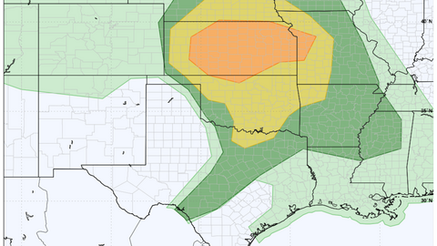Weather map showing risk areas with green, yellow, and orange shading over central and southern U.S. states.