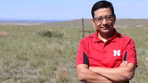 Dr. Bijesh Maharjan standing in a field