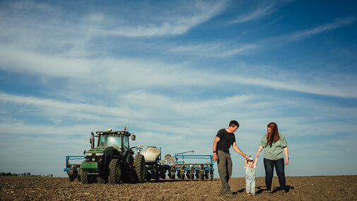 Farm family in field