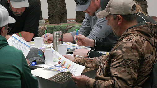 Soil school attendees working