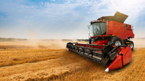 Combine in wheat field