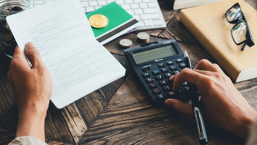 Financial papers and calculator