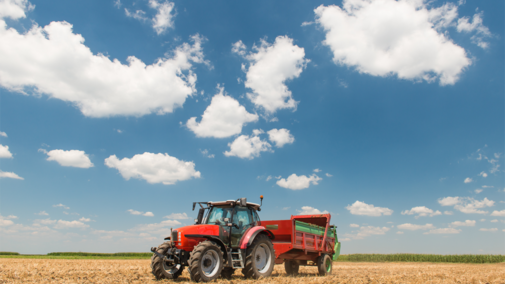 Tractor applying manure