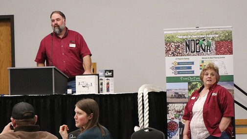 Dan Hinman speaks at podium