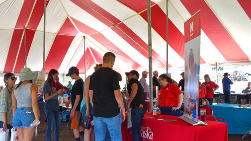 People gathered inside tent