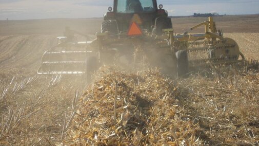 Raking Downed corn