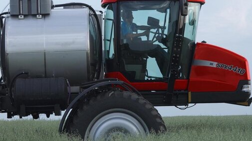 a tractor applying pesticide