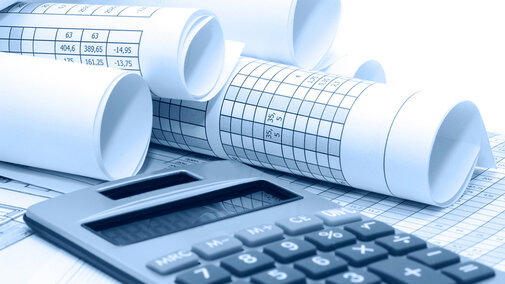 Photo of a calculator and financial records