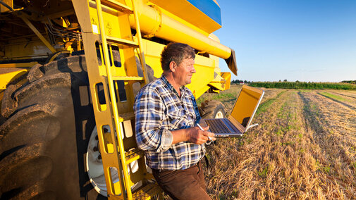 Farmer with laptop