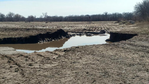 Significant soil erosion in a flooded field