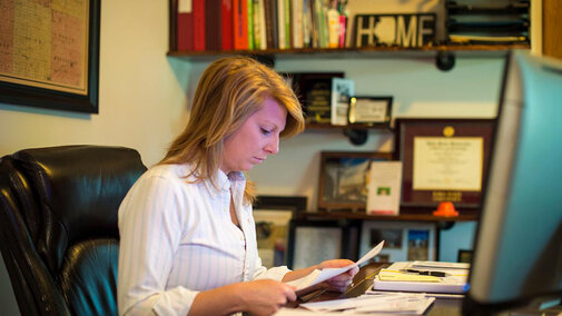 Woman with financial papers