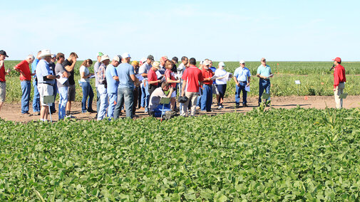 Figure 1. Amit Jhala, Extension Weed Management Specialist discussing weed control and crop safety in new multiple herbicide-tolerant soybeans.