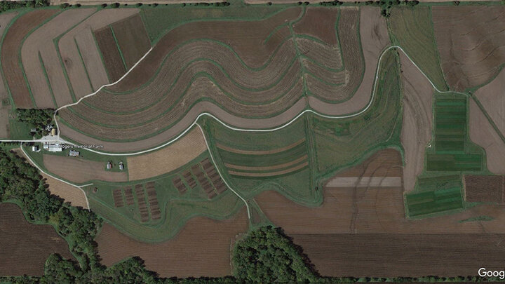 Aerial photo of farm with a variety of plots