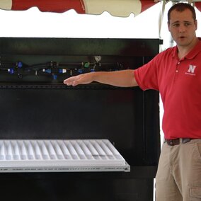 Greg Kruger, Nebraska Extension Weed Science and Application Technology Specialist, presenting sprayer nozzle information at a previous event.