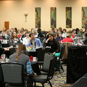 Michelle Soll, farm and ranch program director with Legal Aid of Nebraska, speaks at the 33rd annual Women in Agriculture Conference in Kearney. More than 250 women attended the conference Feb. 22 and 23. (Photo by Haley Apel)