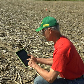 Farmer with tablet