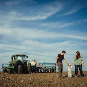 Farm family in field