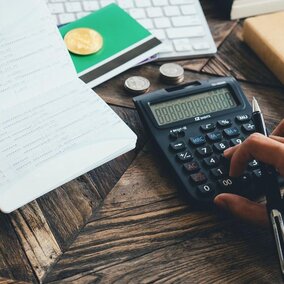 Financial papers and calculator