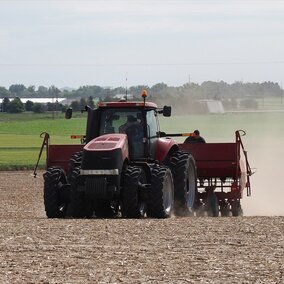 tractor planting pinto beans in Boxe Butte County