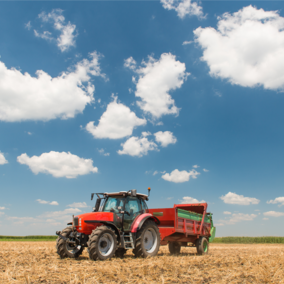 Tractor applying manure