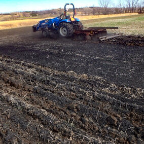 Tractor disking field