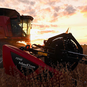 Combine harvesting soybean