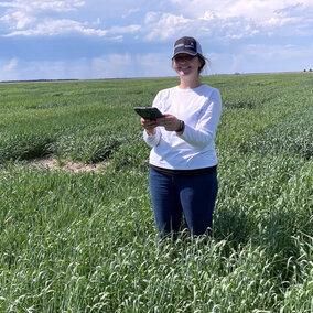 woman standing in wheat field