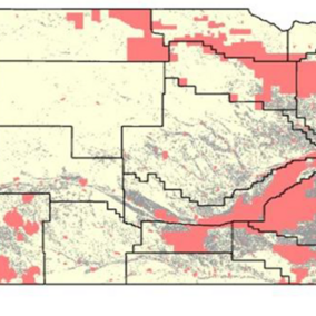 Nebraska map of NiRIA priority areas: Priority A (red) concentrated along the central Platte corridor and parts of the northeast and southwest; Priority B (gray) scattered in broad bands statewide; all other areas Priority C (pale yellow).