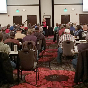 Extension Entomologist Julie Peterson speaking at an earlier Crop Production Clinic.