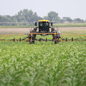 In-season nitrogen (UAN) is applied to corn in an on-farm research study. For fields with suspected nitrogen loss, on-farm research is a great way to evaluate in-season N rates and recommendation approaches. (Photo by Richard Ferguson)