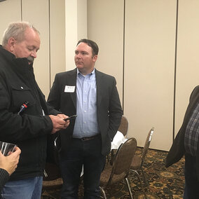 Discussing irrigation management at the annual UNL-TAPS banquet were (L-R): UNL-TAPS competitors Carla McCullough, Roric  Paulman, and Tim Franklin, and Gerald Franklin. (Photo by Amy Kremen)