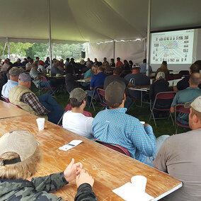 Growers participating in the UNL TAPS competition gather to discuss what they've learned. 