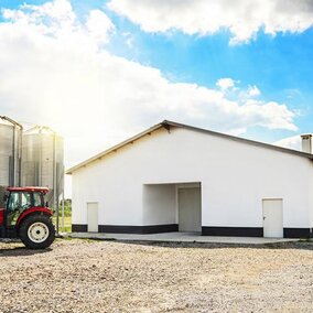 tractor in front of machine shed