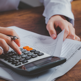 Closeup of man preparing tax forms