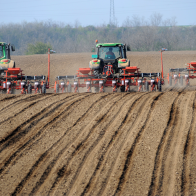 Tractors prepping field