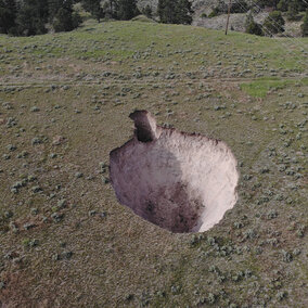 An aerial view of the sink holes created by the July 17 tunnel collapse on the Gering-Fort Laramie/Goshen Irrigation District canal.