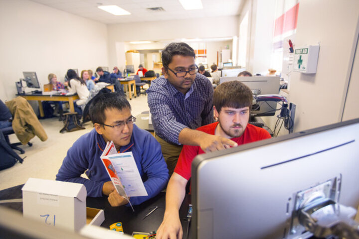 Santosh Pitla working with engineering students