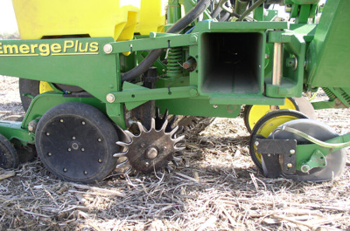 Photo of a no-till planter with heavy pressure springs