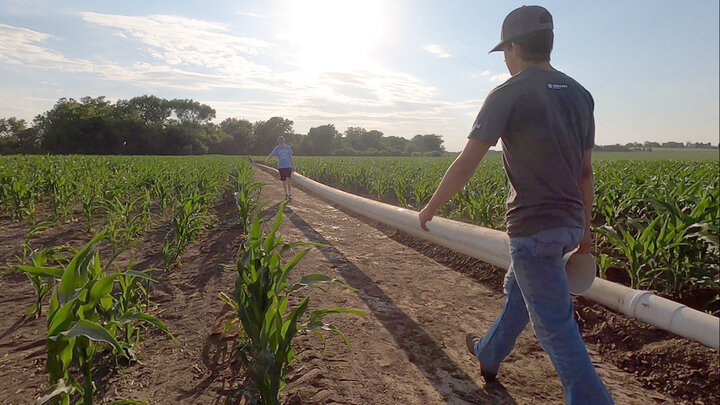 Contestants setting irrigation