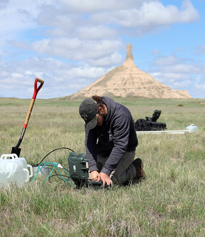 Researcher works with equipment