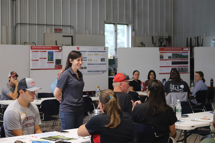 Andrea Basche speaking with seated attendees